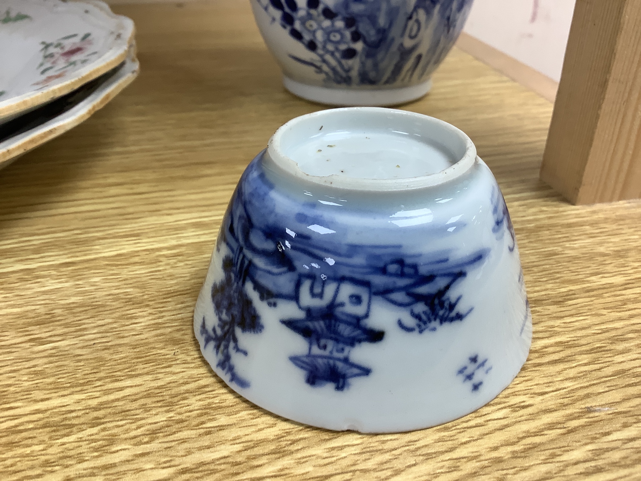 A Chinese late 19th century blue and white vase, height 25.5cm, a pair of 18th century Chinese export famille rose plates and a blue and white tea bowl